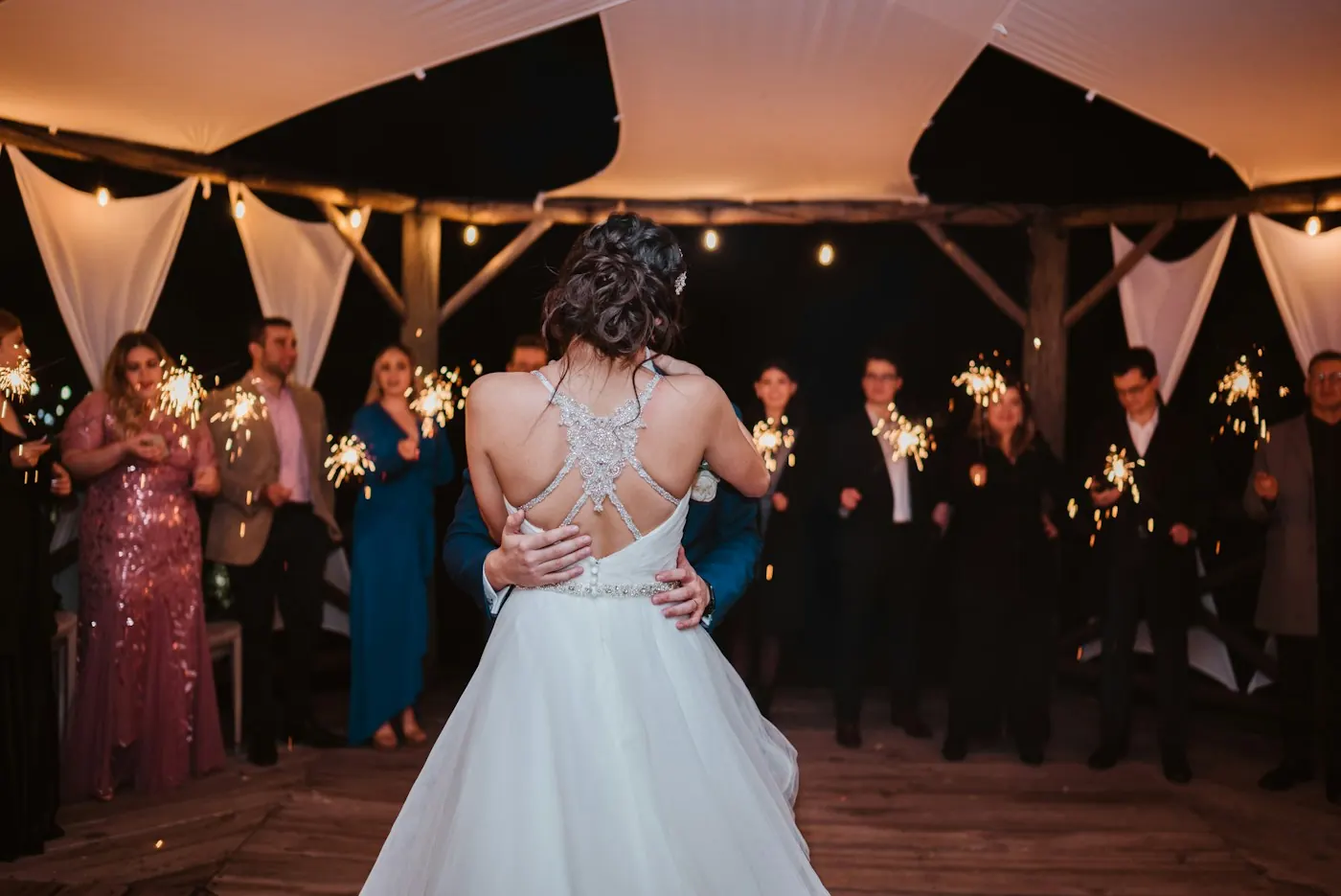 A couple celebrating with sparklers